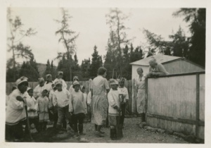 Image of Eskimo [Inuit] children at MacMillan Moravian Mission School with Kate Hettasch, Freida